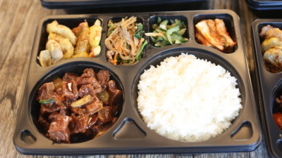 불고기·잡채와 함께… 설 특식 도시락에 힘 얻는 한국 선수단